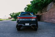 Rally Armor 22-25 Rivian R1T Black UR Mud Flap w/Tangerine Scream Logo