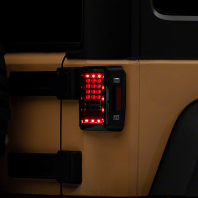 Raxiom 07-18 Jeep Wrangler JK Axial Series LED Tail Lights- Blk Housing (Clear Lens)