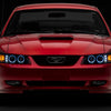 Raxiom 99-04 Ford Mustang Dual LED Halo Projector Headlights- Black Housing (Clear Lens)