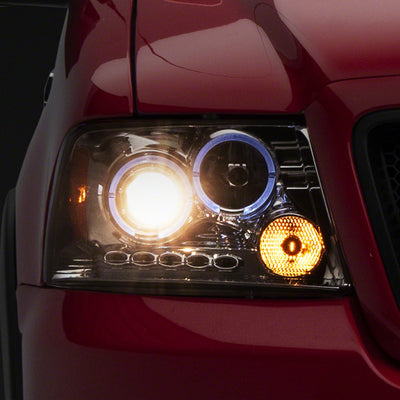 Raxiom 04-08 Ford F-150 Dual LED Halo Projector Headlights- Chrome Housing (Clear Lens)