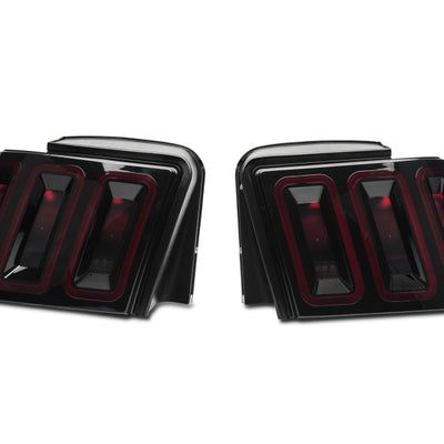 Raxiom 99-04 Ford Mustang Excluding 99-01 Cobra Icon LED Tail Lights- Black Housing (Smoked Lens)