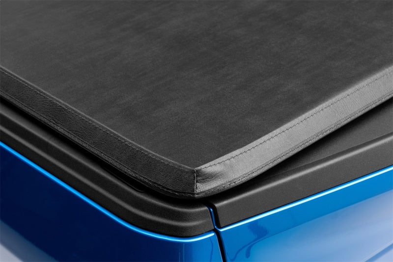 Lund 02-17 Dodge Ram 1500 (6.5ft. Bed Excl. Beds w/Rambox) Genesis Tri-Fold Tonneau Cover - Black