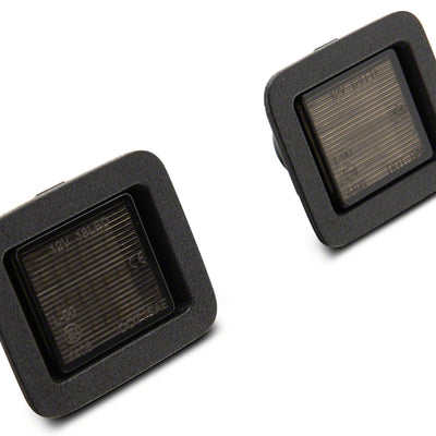 Raxiom 07-14 Ford F-150 Axial Series LED License Plate Lamps- Smoked