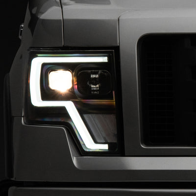 Raxiom 09-14 Ford F-150 G4 Projector Headlights- Black Housing (Clear Lens)