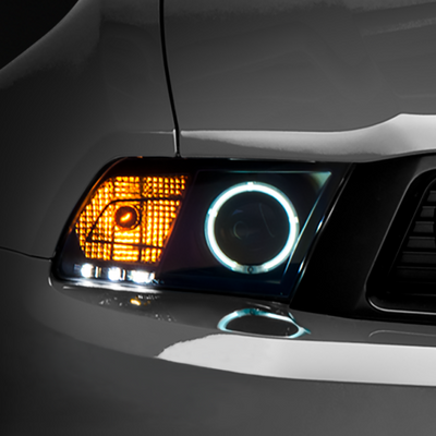 Raxiom 10-12 Ford Mustang w/ Headlights CCFL Halo Projector Headlights- Black Housing (Clear Lens)