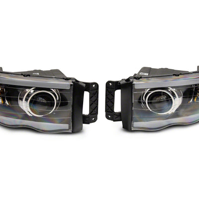 Raxiom 02-05 Dodge RAM 1500/2500/3500 Axial LED Projector Headlights- Blk Housing (Clear Lens)