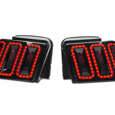 Raxiom 99-04 Ford Mustang Excluding 99-01 Cobra Icon LED Tail Lights- Black Housing (Smoked Lens)