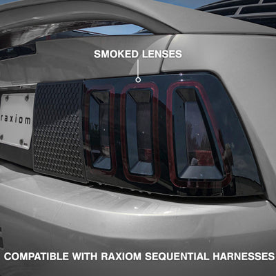 Raxiom 99-04 Ford Mustang Excluding 99-01 Cobra Icon LED Tail Lights- Black Housing (Smoked Lens)