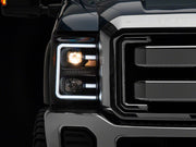 Raxiom 11-16 Ford F-250 Super Duty LED Projector Headlights - Black Housing (Clear Lens)