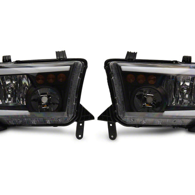 Raxiom 07-13 Toyota Tundra Axial Series Headlights w/ LED Bar- Blk Housing (Clear Lens)