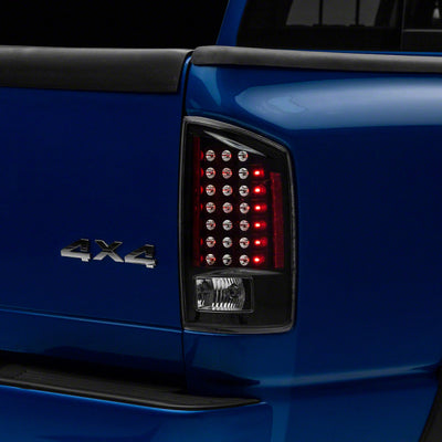 Raxiom 07-08 Dodge RAM 1500 LED Tail Lights- Blk Housing (Clear Lens)