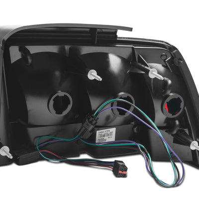 Raxiom 99-04 Ford Mustang Excluding 99-01 Cobra Icon LED Tail Lights- Black Housing (Smoked Lens)