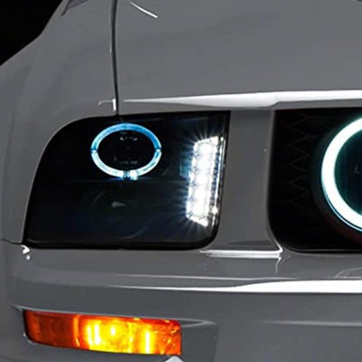 Raxiom 05-09 Ford Mustang w/ Halogen LED Halo Prjctr Headlights-Blk Hsng(Smoked Lens Exclude GT500)