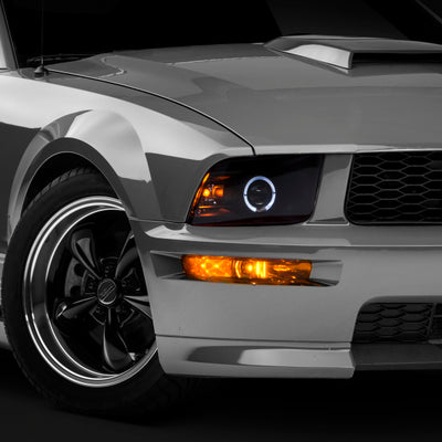 Raxiom 05-09 Ford Mustang Halogen 2010 Style LED Halo Headlights-Blk Hsng(Clear Lens/Excludes GT500)