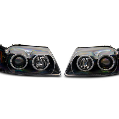 Raxiom 99-04 Ford Mustang Dual LED Halo Projector Headlights- Black Housing (Clear Lens)