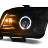 Raxiom 05-09 Ford Mustang Halogen 2010 Style LED Halo Headlights-Blk Hsng(Clear Lens/Excludes GT500)