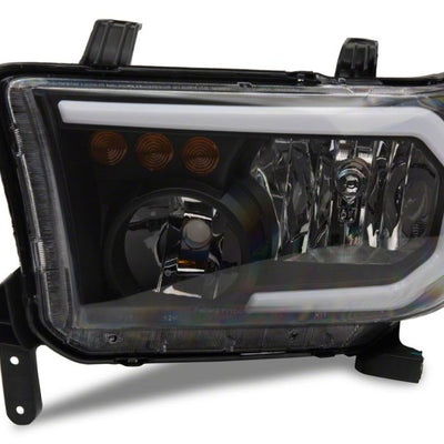 Raxiom 07-13 Toyota Tundra Axial Series Headlights w/ LED Bar- Blk Housing (Clear Lens)