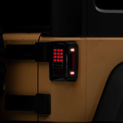 Raxiom 07-18 Jeep Wrangler JK Axial Series LED Tail Lights- Blk Housing (Clear Lens)