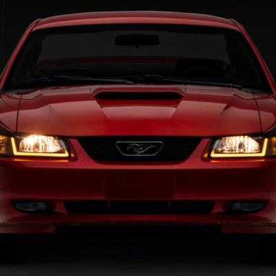 Raxiom 99-04 Ford Mustang Axial Series Headlights w/ Sequential LED Bar- Blk Housing (Clear Lens)