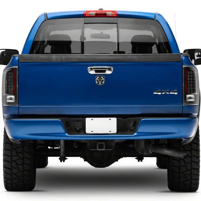 Raxiom 07-08 Dodge RAM 1500 LED Tail Lights- Blk Housing (Clear Lens)