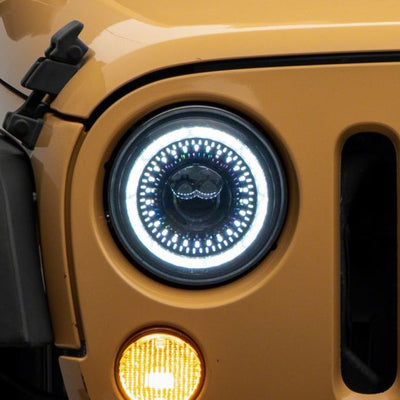 Raxiom 07-18 Jeep Wrangler JK Axial Series 7-In Dragon Eye LED Headlights- Blk Housing (Clear Lens)