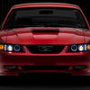 Raxiom 99-04 Ford Mustang Dual LED Halo Projector Headlights- Black Housing (Clear Lens)