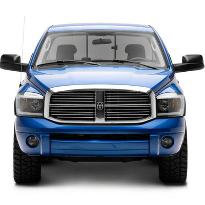 Raxiom 06-09 Dodge RAM 1500/2500/3500 Axial Headlights w/ SEQL LED Bar- Blk Housing (Clear Lens)
