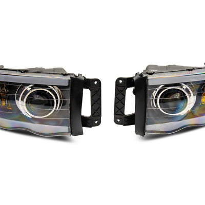 Raxiom 02-05 Dodge RAM 1500 LED Projector Headlights w/ SEQL LED Bar- Blk Housing (Clear Lens)